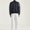 レザーとサテン製のボンバージャケット。Givenchy Parisの刺繍入り レザーとサテン製のボンバージャケット。Givenchy Parisの刺繍入り