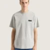 コットン製Tシャツ（Givenchyパッチ付き）