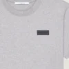 コットン製Tシャツ（Givenchyパッチ付き）